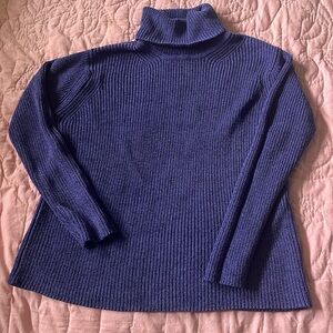 Debra Deroo Turtleneck Sweater.